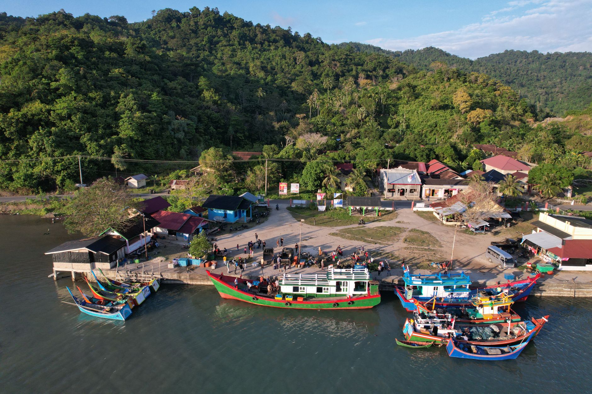 Rebuilt village houses on the Aceh coast, echoing the reconstruction that followed the 2005 quake
