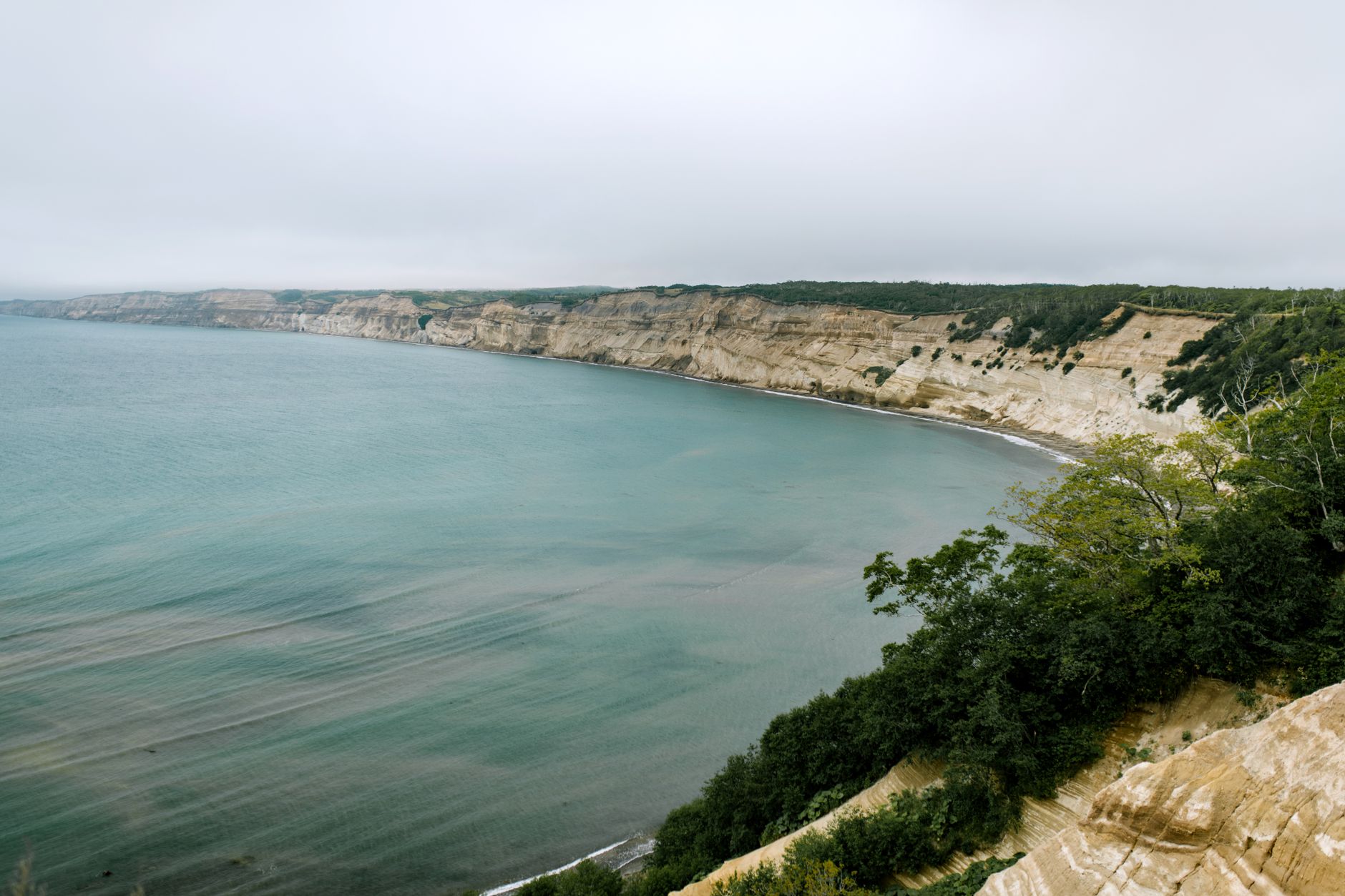 Rugged volcanic coastline shaped by tectonic activity